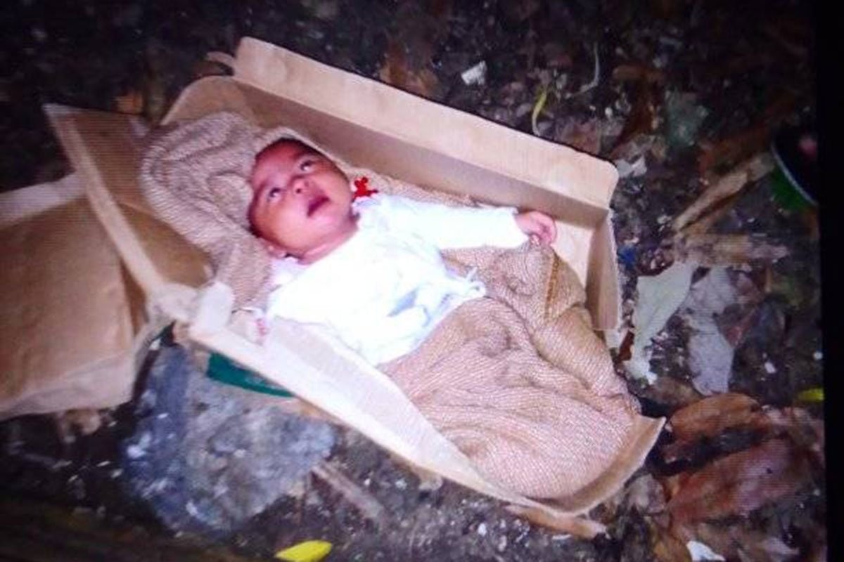 «Пожалуйста, помогите моему ребенку выжить»: на филиппинской парковке нашли трехмесячную девочку - слайд 